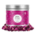 Canister of dried rose petals with a pink floral label, surrounded by loose petals.