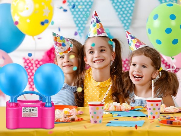 Children at a party with an electric balloon pump and blue balloons