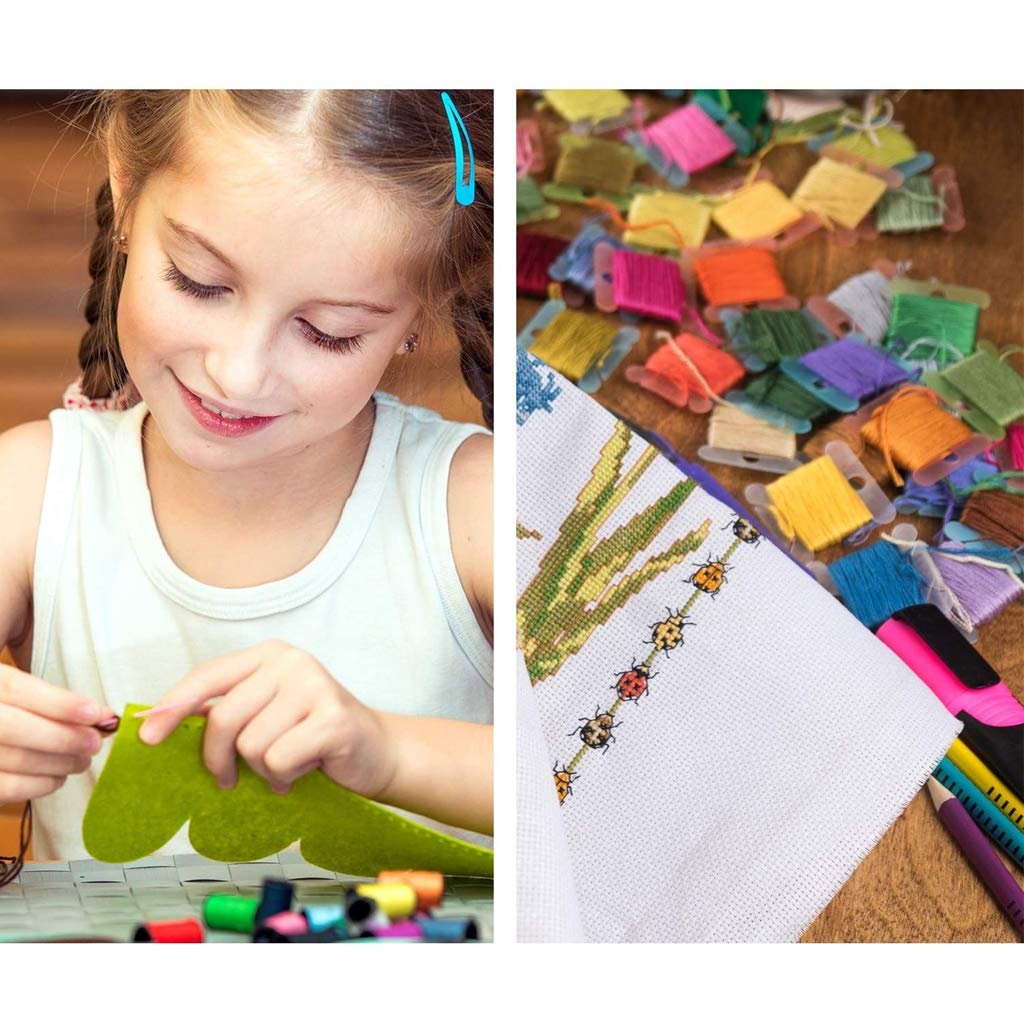 Young girl doing embroidery next to a collection of colorful embroidery floss on bobbins and a cross-stitch project