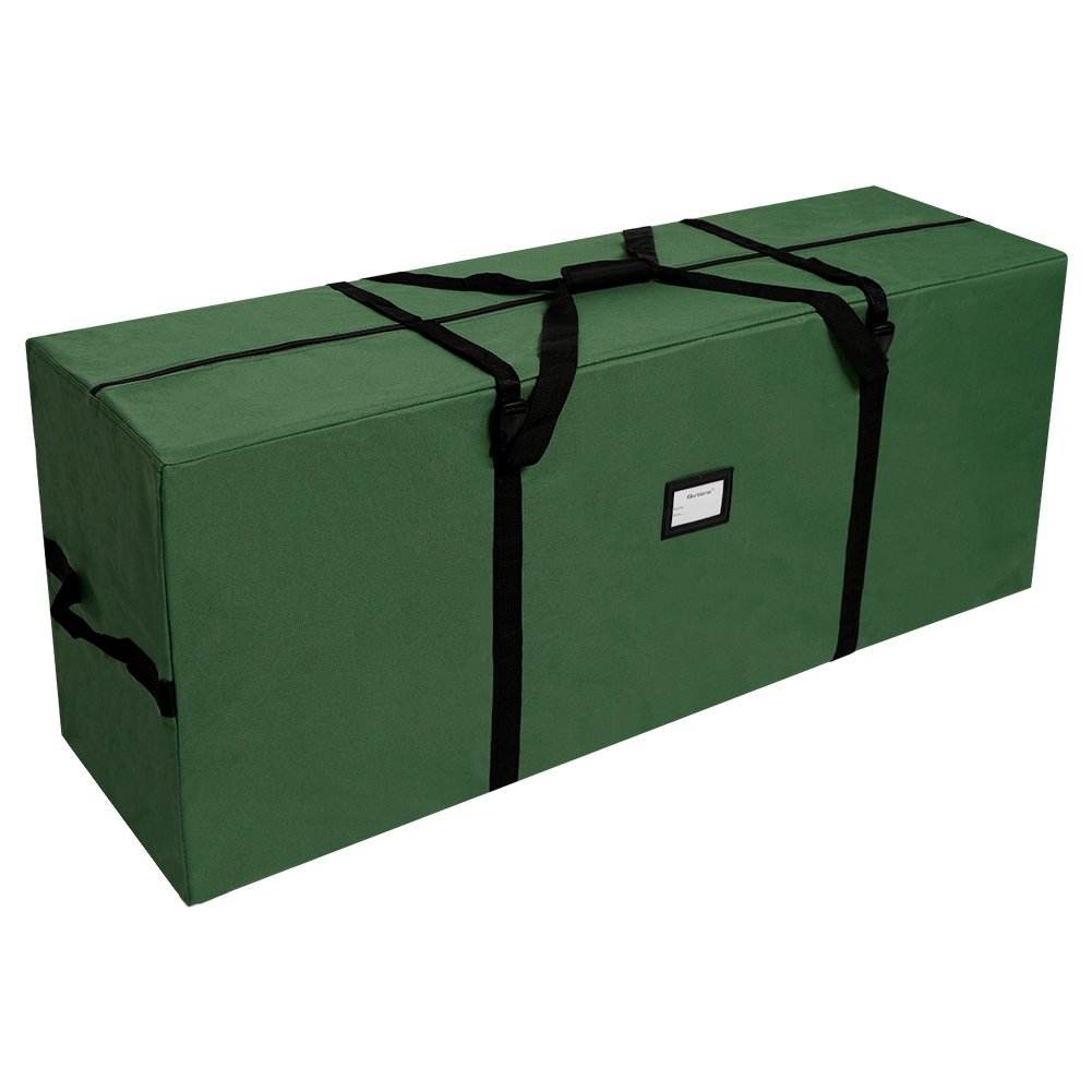 Green Christmas tree storage bag with black straps and handles, shown from a three-quarter angle on a white background.