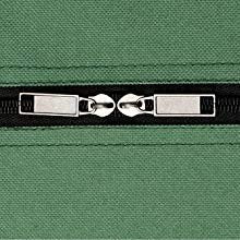 Close-up of a green Christmas tree storage bag zipper with two silver pulls.