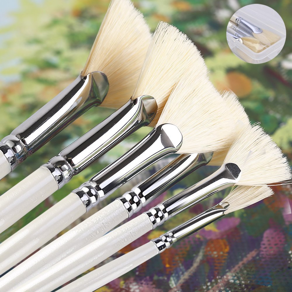 Fan paint brushes with white handles and metal ferrules, shown in a fanned arrangement on a colorful background. A small inset shows a clear plastic case with brushes.