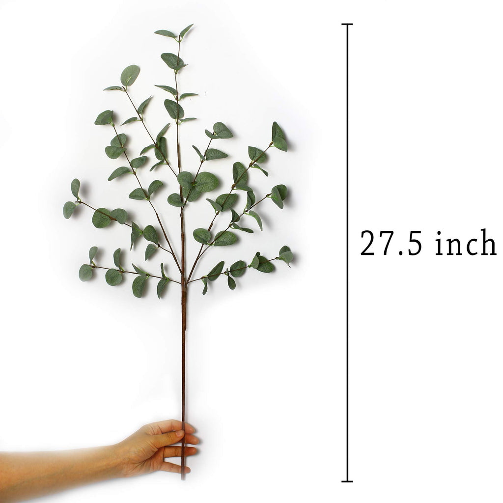 Hand holding a 27.5-inch faux eucalyptus stem with green leaves against a white background.