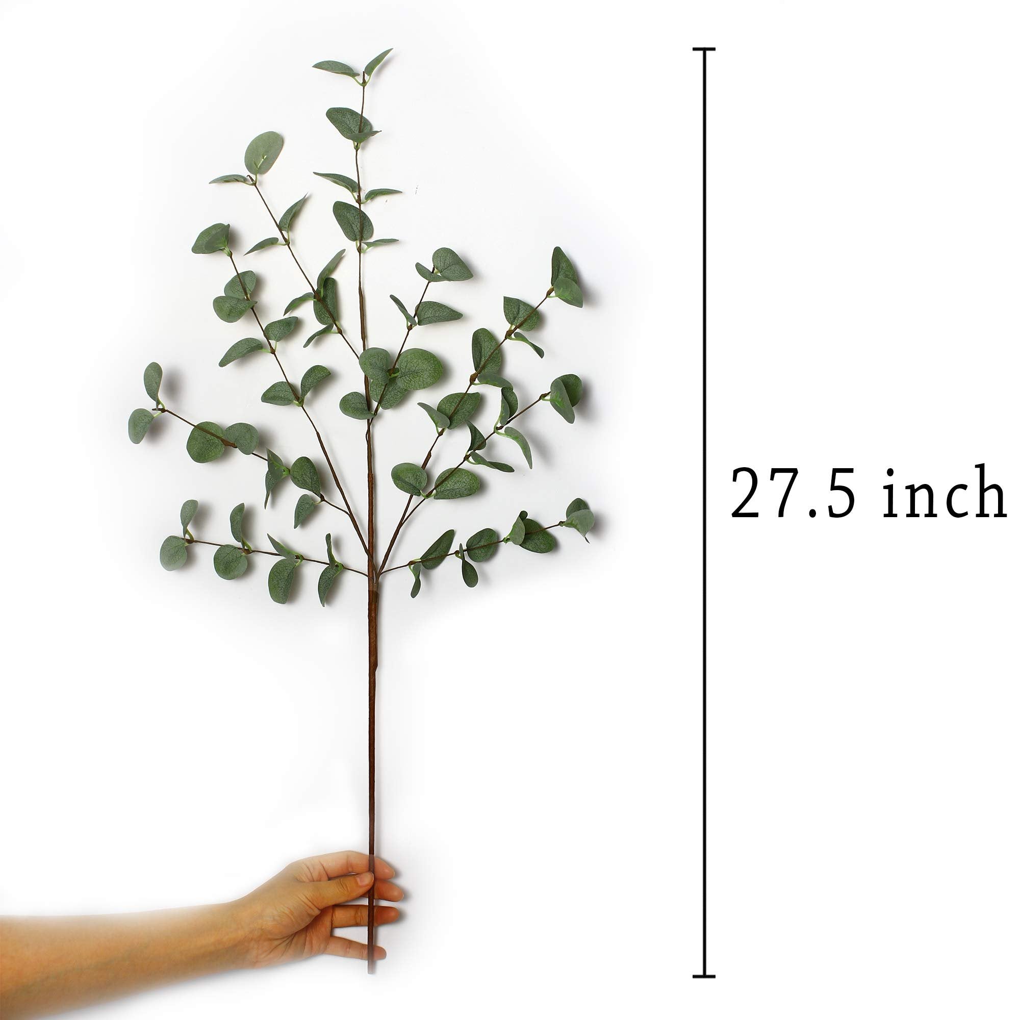 Hand holding a 27.5-inch faux eucalyptus stem with green leaves against a white background.
