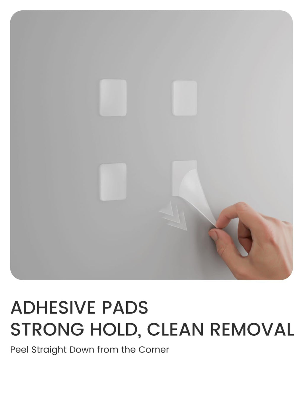 Hand peeling adhesive pad from a gray surface, showing four pads total.
