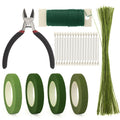 Floral arrangement kit including wire cutters, green floral tape rolls, pearl-headed floral pins, and green floral wire on a white background.