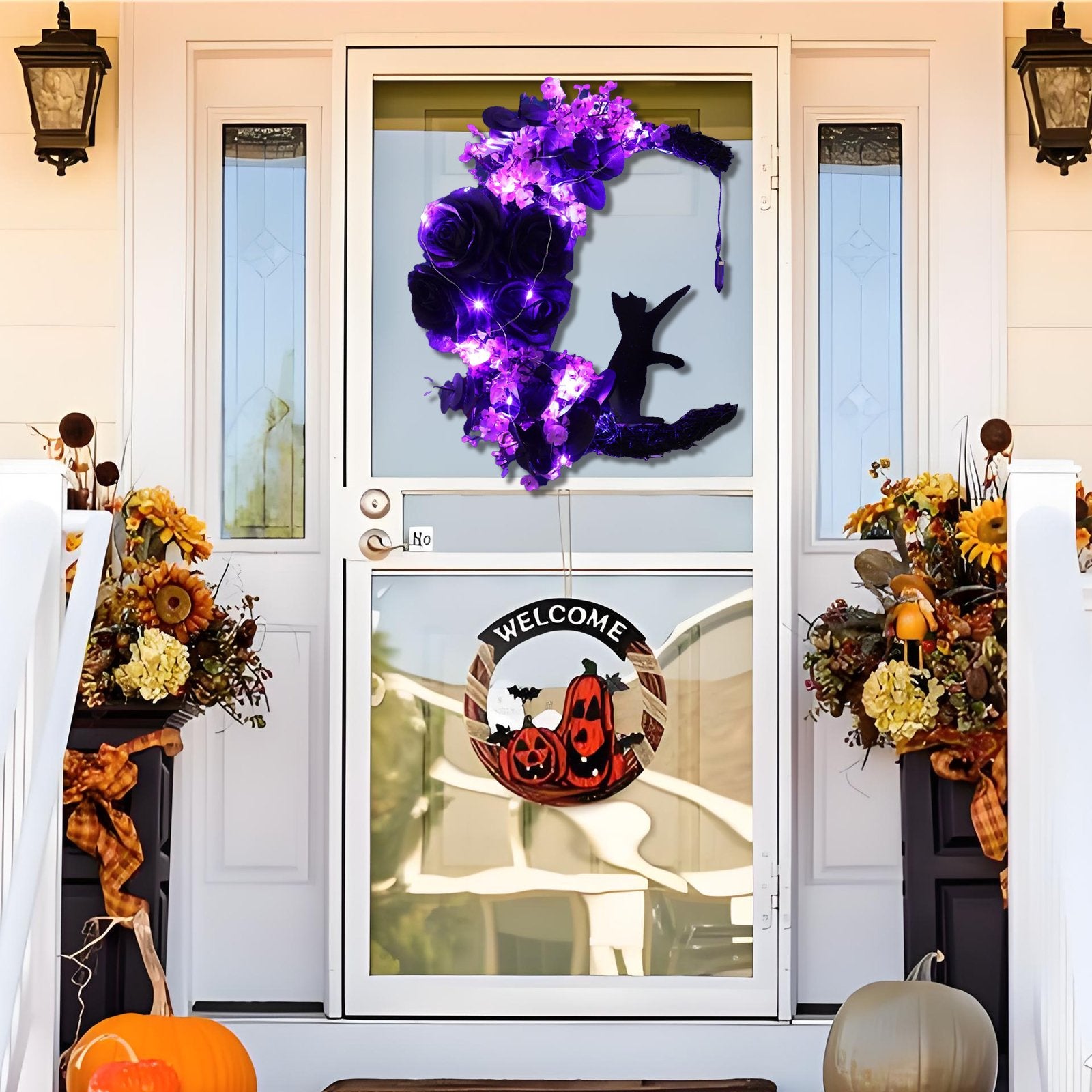 Halloween moon wreath with black cat and purple lights on a screen door, with a welcome sign below
