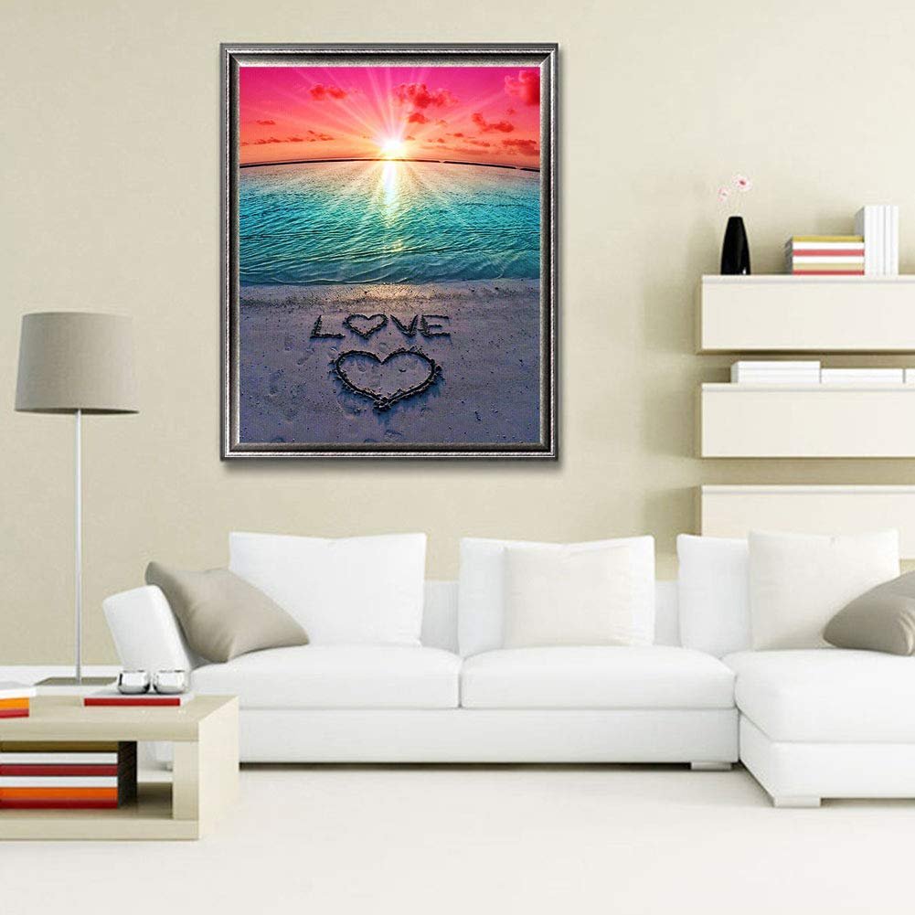 Diamond painting kit showing a beach sunset with the word LOVE and a heart drawn in the sand.