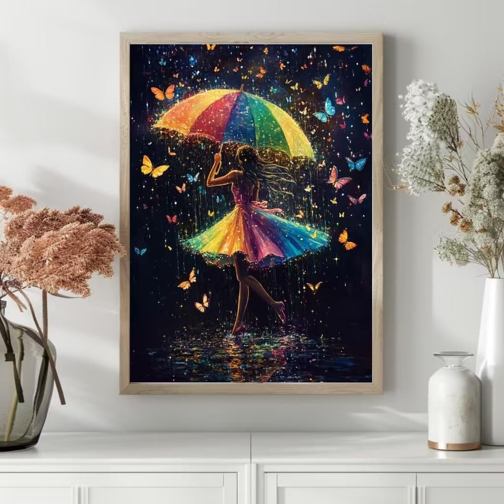 Diamond art painting of a woman holding a rainbow umbrella surrounded by butterflies and rain