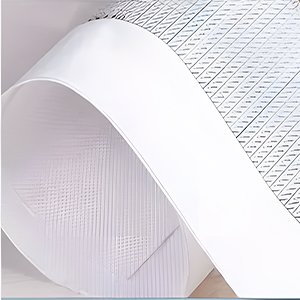 White rolled canvas with a textured grid pattern, abstract close-up.