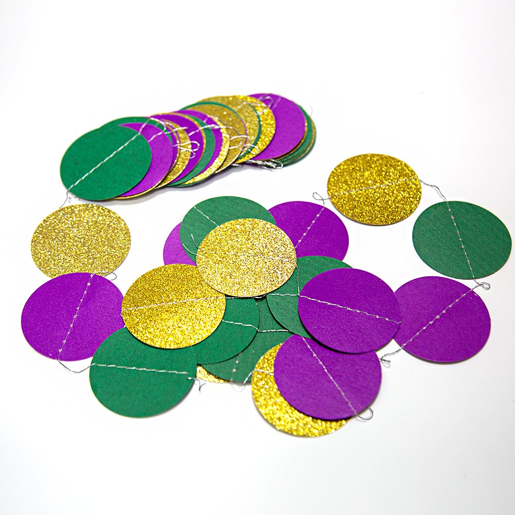 Gold, purple, and green glitter circle garland strands on a white background, close-up view.