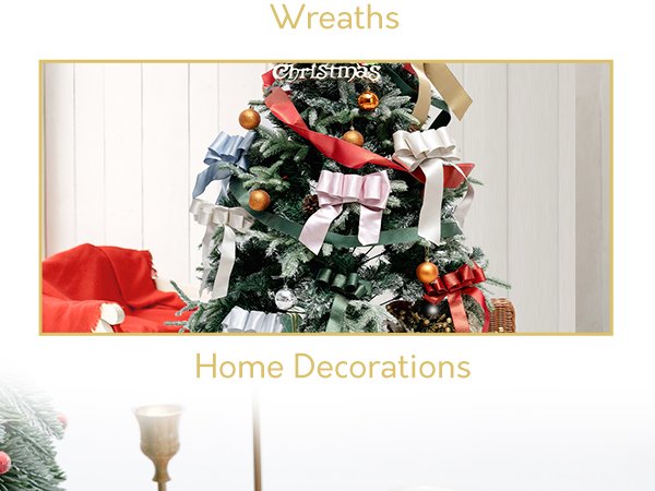 Christmas tree decorated with various colored satin ribbons tied into bows, with a red throw on a chair nearby.
