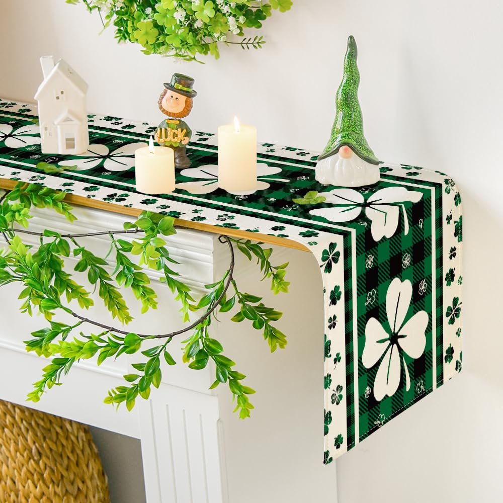 Green clover buffalo plaid St. Patrick's Day table runner draped over a mantelpiece with decorations