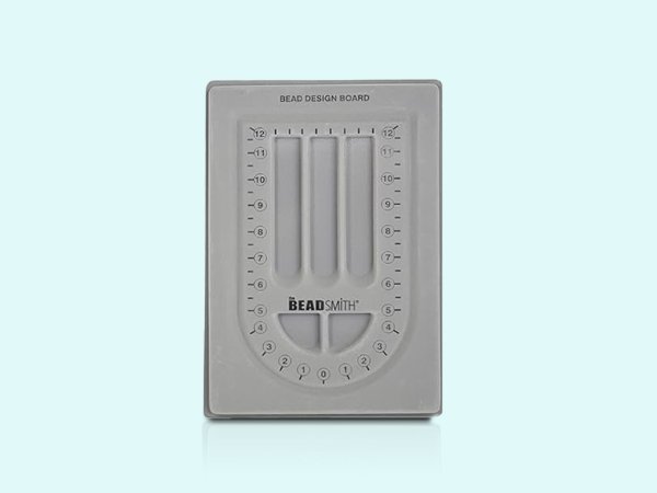 Grey bead design board with ruler markings and three U-shaped channels, featuring logo.