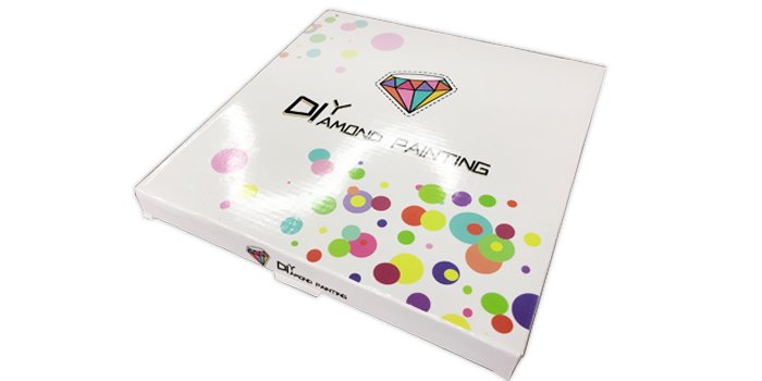 White box for a diamond painting kit with colorful circles and a diamond logo.