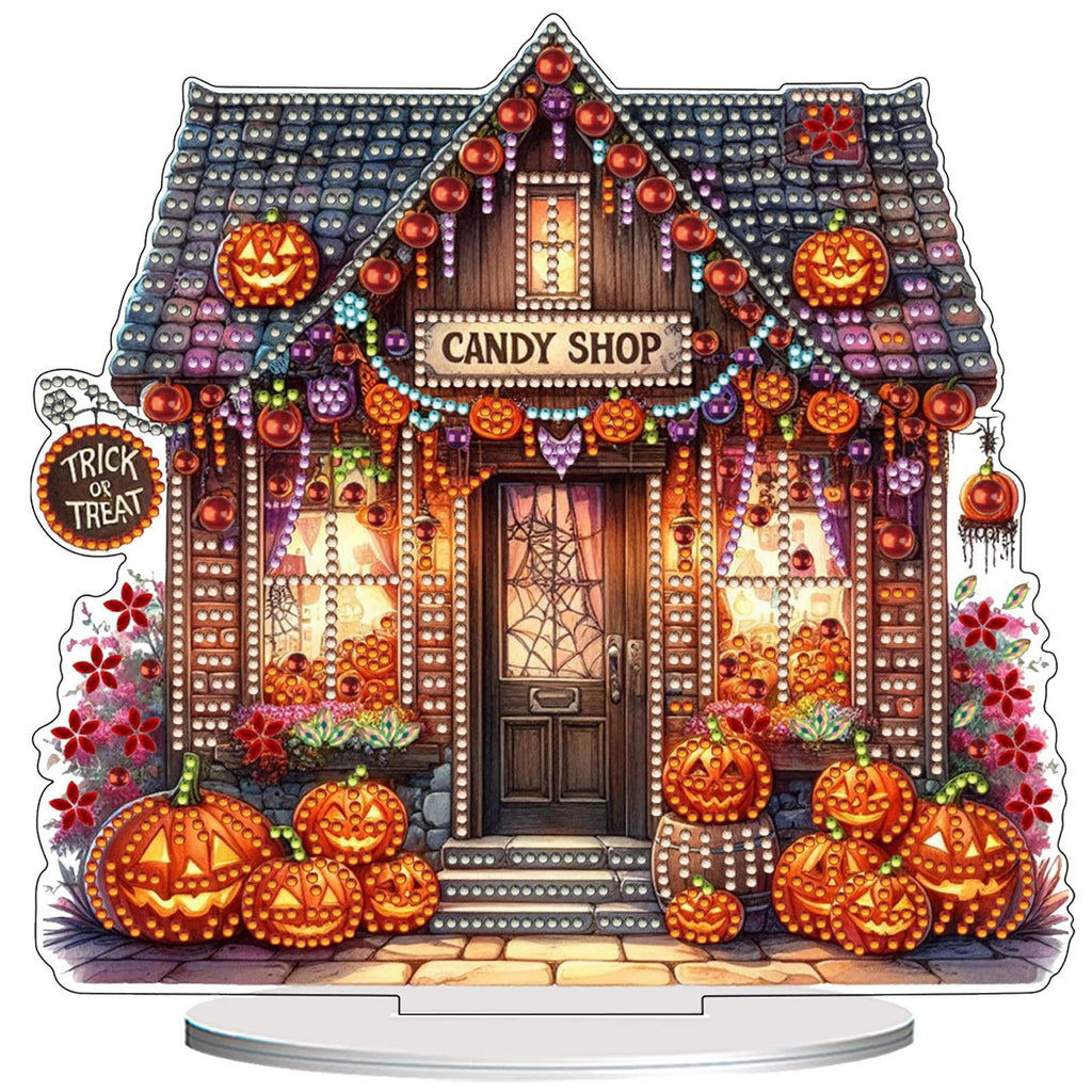 Halloween candy shop tabletop ornament with pumpkins and lights, featuring a 'Candy Shop' sign and 'Trick or Treat' sign.