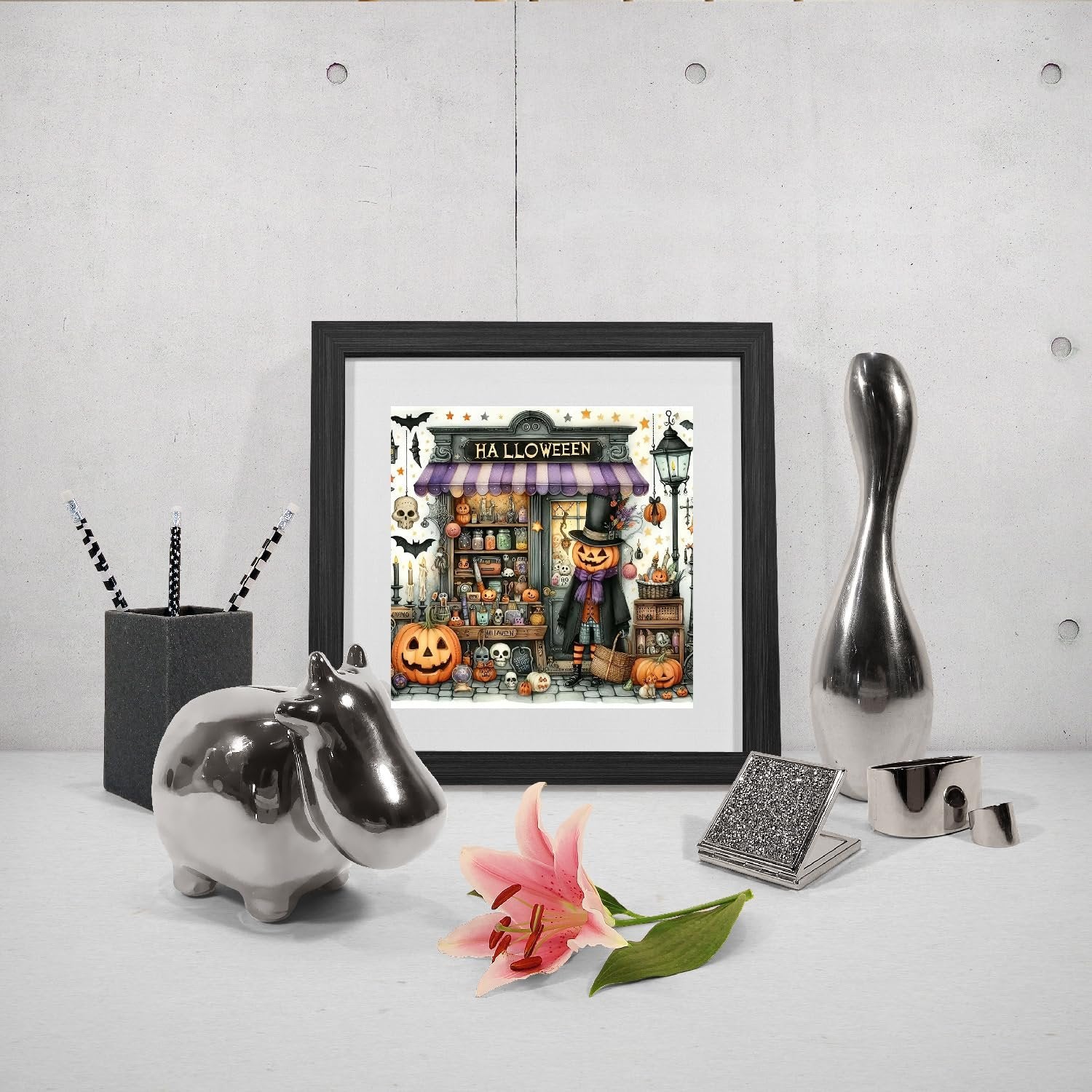 Framed Halloween diamond painting kit featuring a vintage shop with a scarecrow, pumpkins, and skulls.