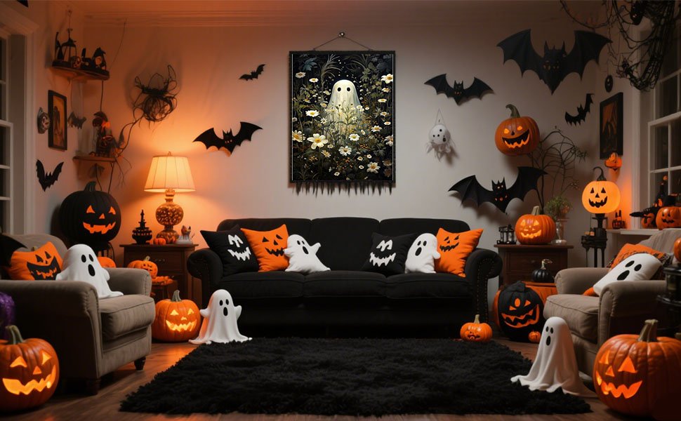 Living room decorated for Halloween with pumpkins, ghost pillows, and a ghost painting on the wall.