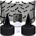 Halloween witch hat kit with black hats, black bats, spider web, creepy cloth, and white string on a white background.
