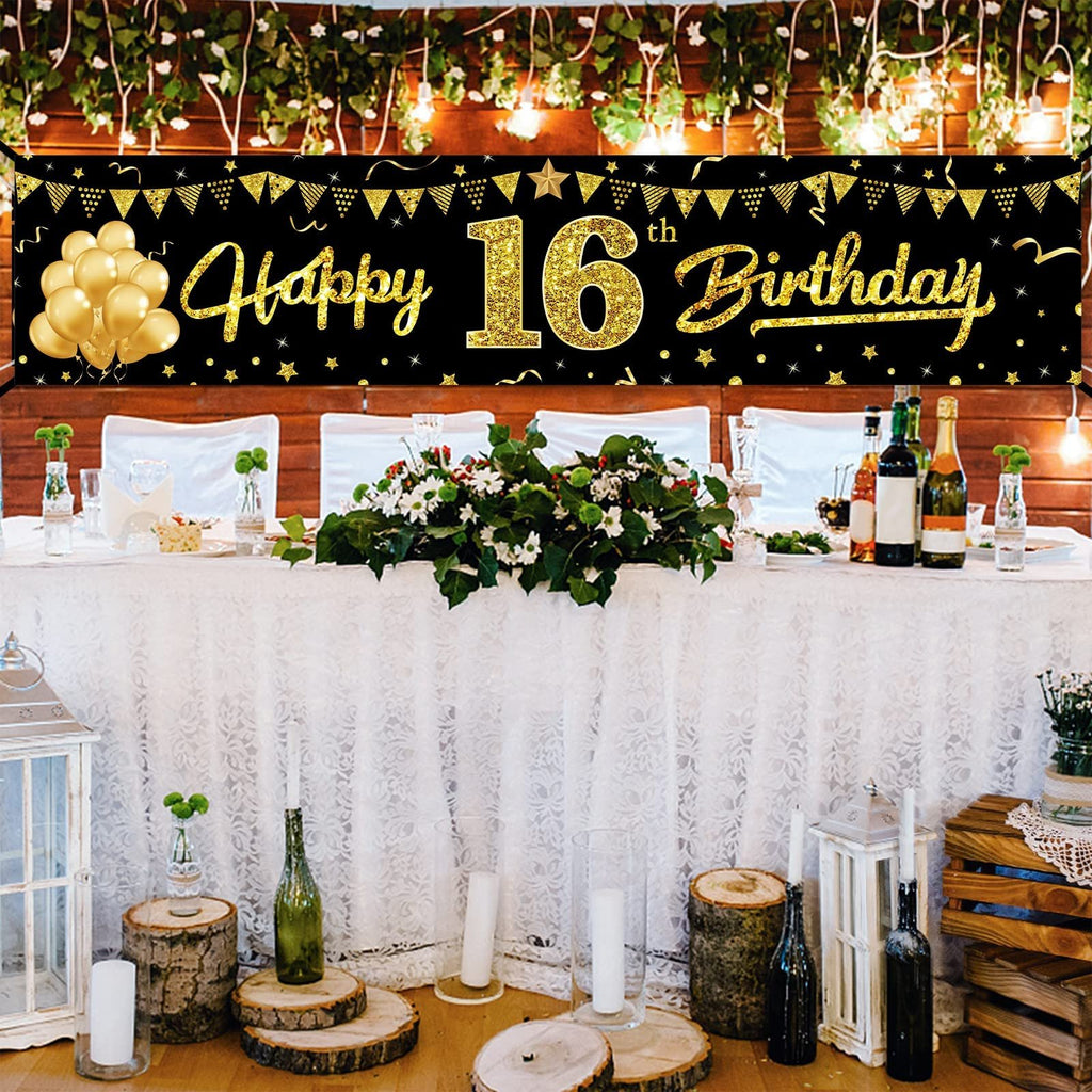 Black and gold 'Happy 16th Birthday' banner with balloons and confetti, displayed above a decorated table.