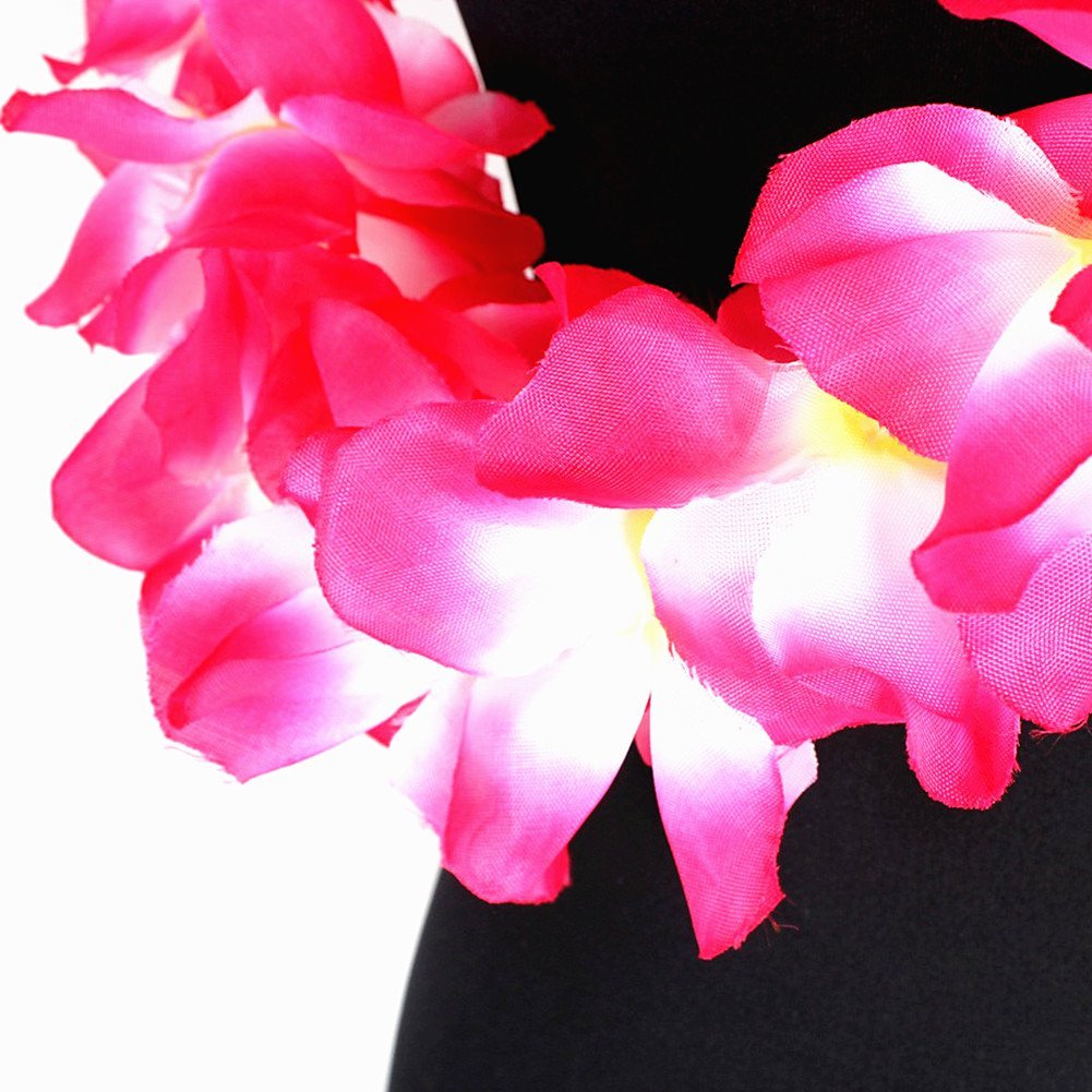 Close-up of a pink artificial flower lei garland draped around a black mannequin bust against a white background.
