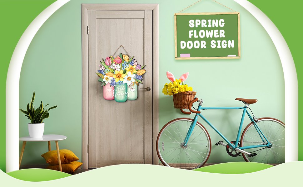 Spring door sign with flowers in mason jars hanging on a door, next to a bicycle with a basket of flowers.