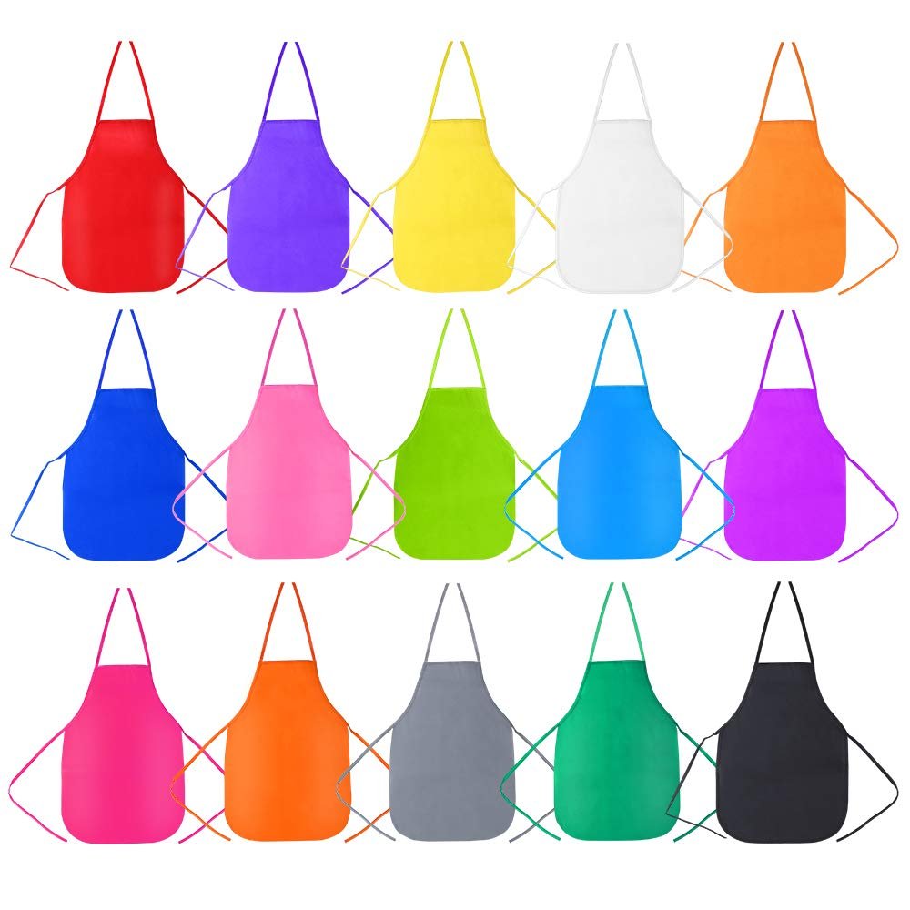 Fifteen assorted color kids art aprons arranged in three rows on a white background.