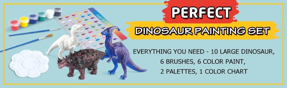 Dinosaur painting craft kit contents including figurines, paint pots, brushes, and palettes on a light blue background.