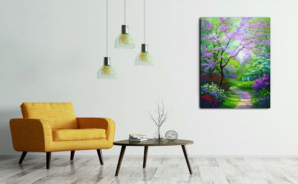 Diamond painting of a park path lined with blooming trees and flowers, with a bench in the distance.