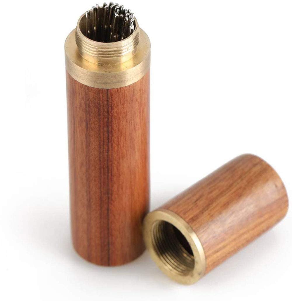 Wooden storage case with brass accents, open to reveal a bundle of blunt darning needles.