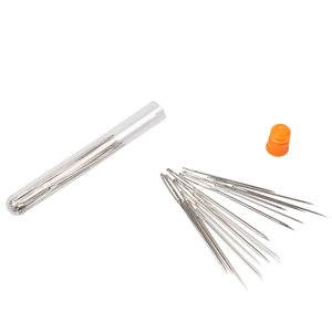 Large eye sewing needles scattered next to a clear storage tube with a few needles inside, and an orange cap.
