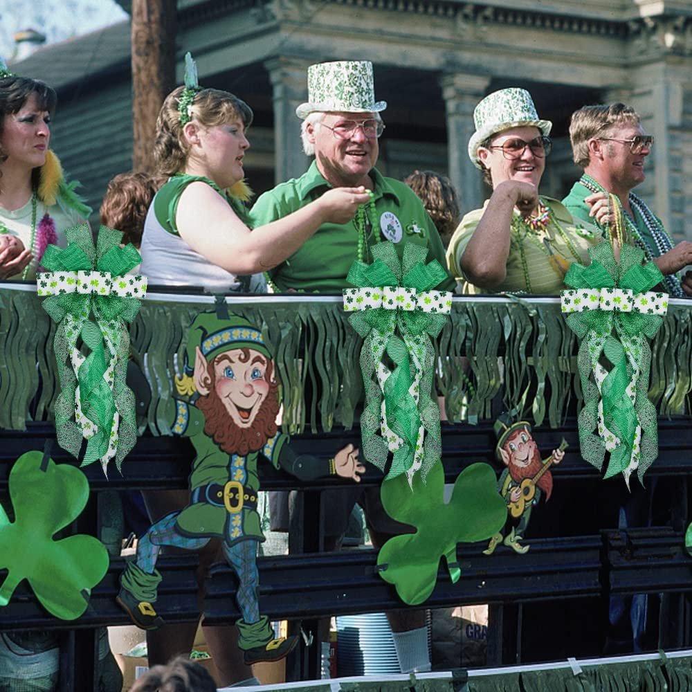 People celebrating St. Patrick's Day on a parade float decorated with green bows and leprechaun cutouts.