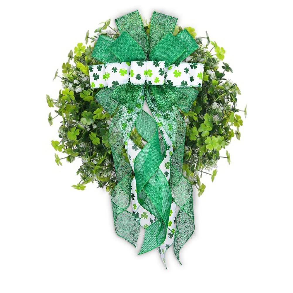 Green glitter plaid polyester yarn bow with shamrock pattern ribbons on a green leafy wreath
