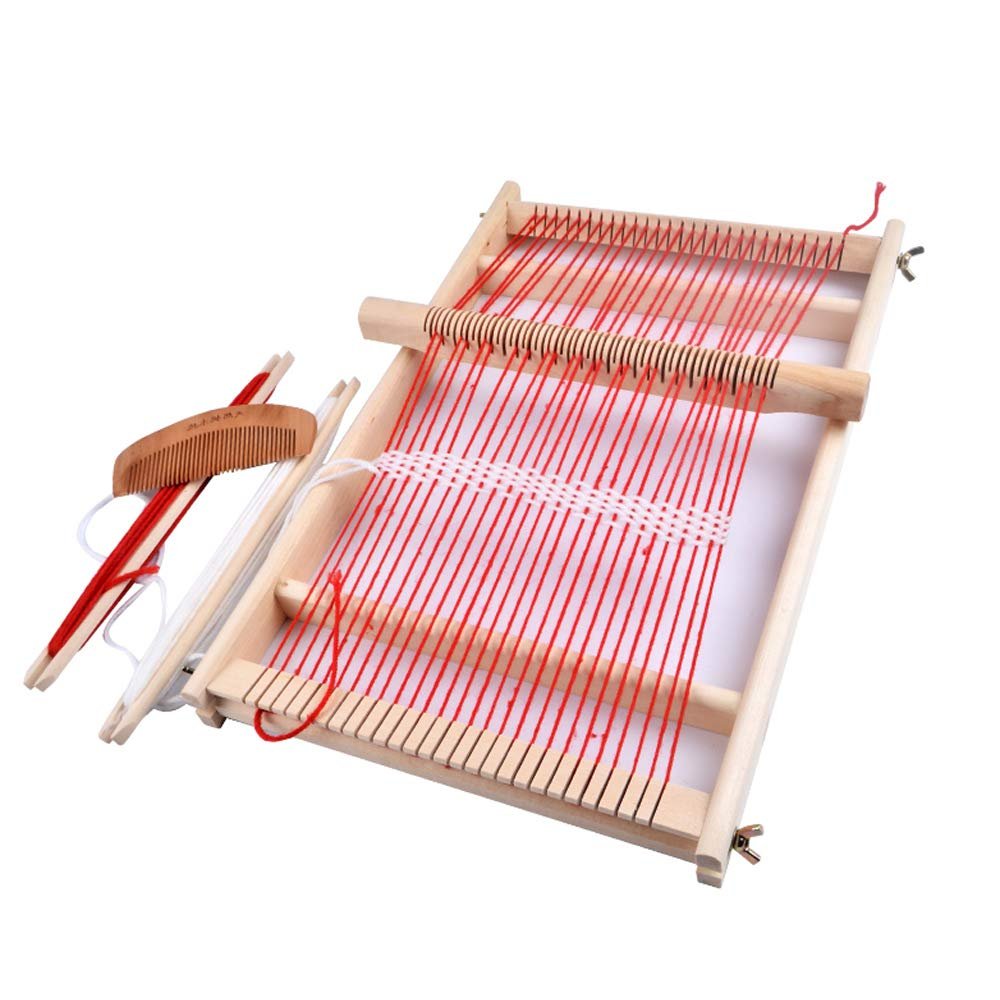 Wooden weaving loom with red and white yarn, including a wooden comb and shuttle sticks.