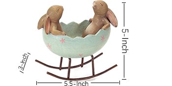 Easter bunny figurine in a cracked egg cradle on a rocking base, with size callouts