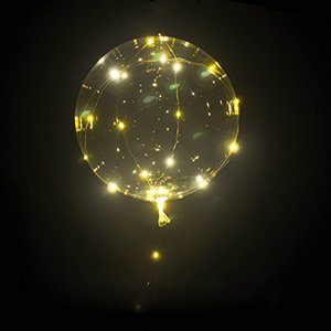 Clear LED light-up bobo balloon with warm white string lights against a dark background.