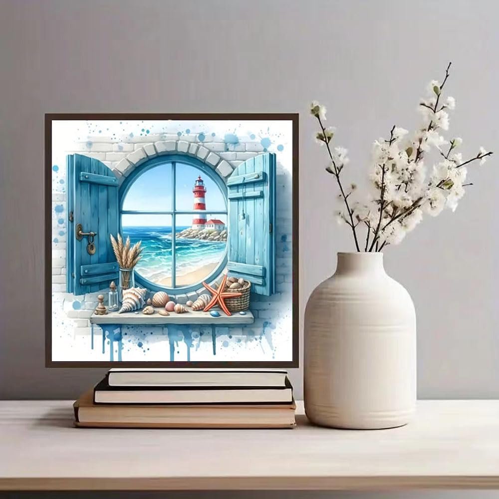 Diamond painting kit showing a lighthouse view through a blue shuttered window with seashells on the sill.