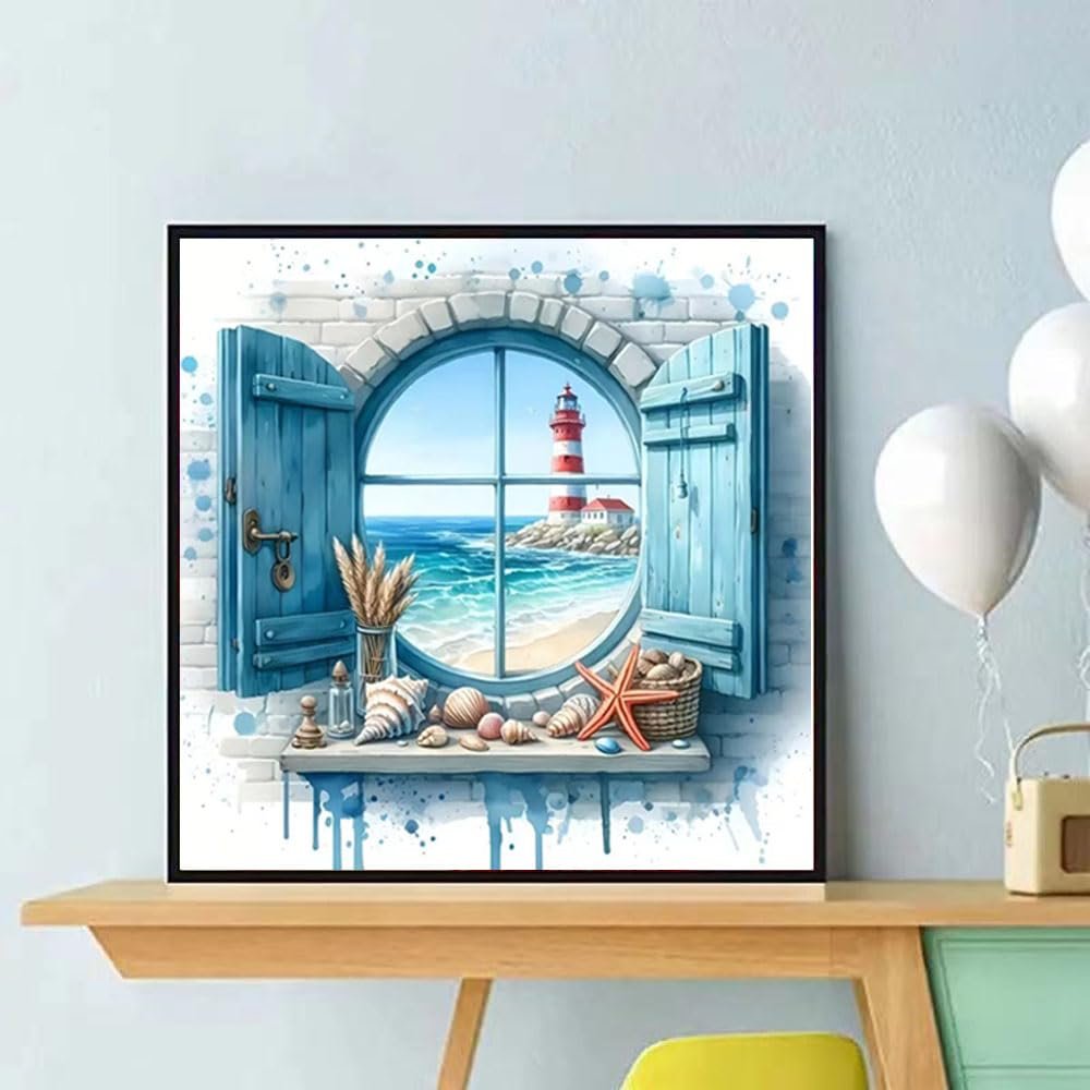 Diamond painting kit showing a round window with blue shutters overlooking a beach and lighthouse scene, with shells on the windowsill.