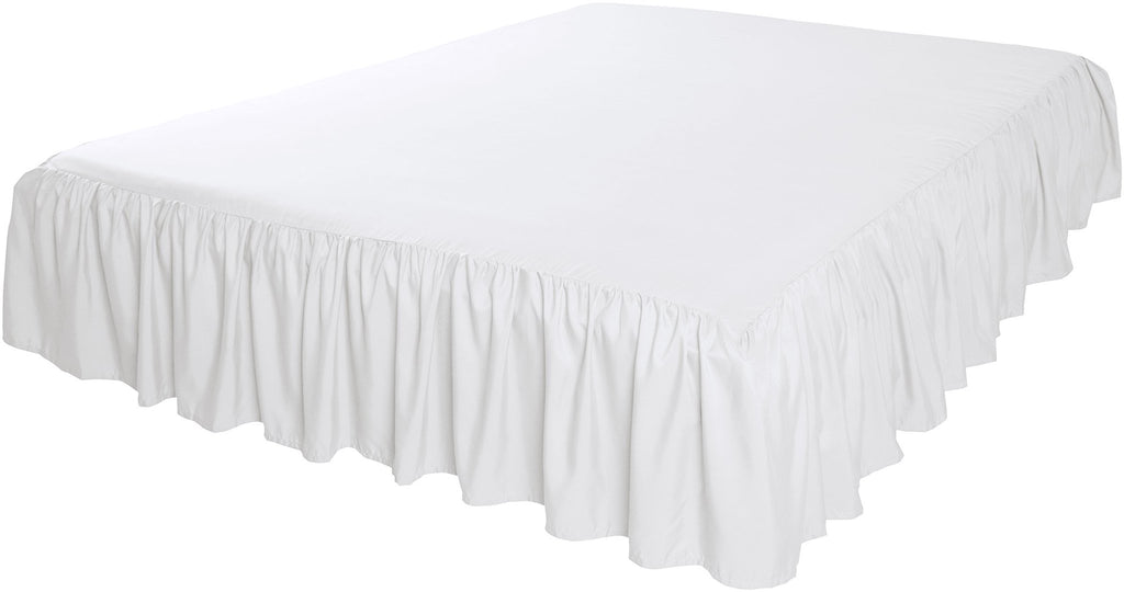 White ruffled bed skirt on a bed, shown from a high angle with the bed skirt covering the sides.