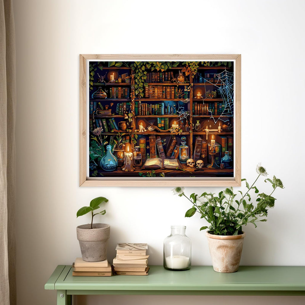 Framed paint by numbers artwork depicting a magical library with bookshelves, candles, skulls, and spiderwebs.