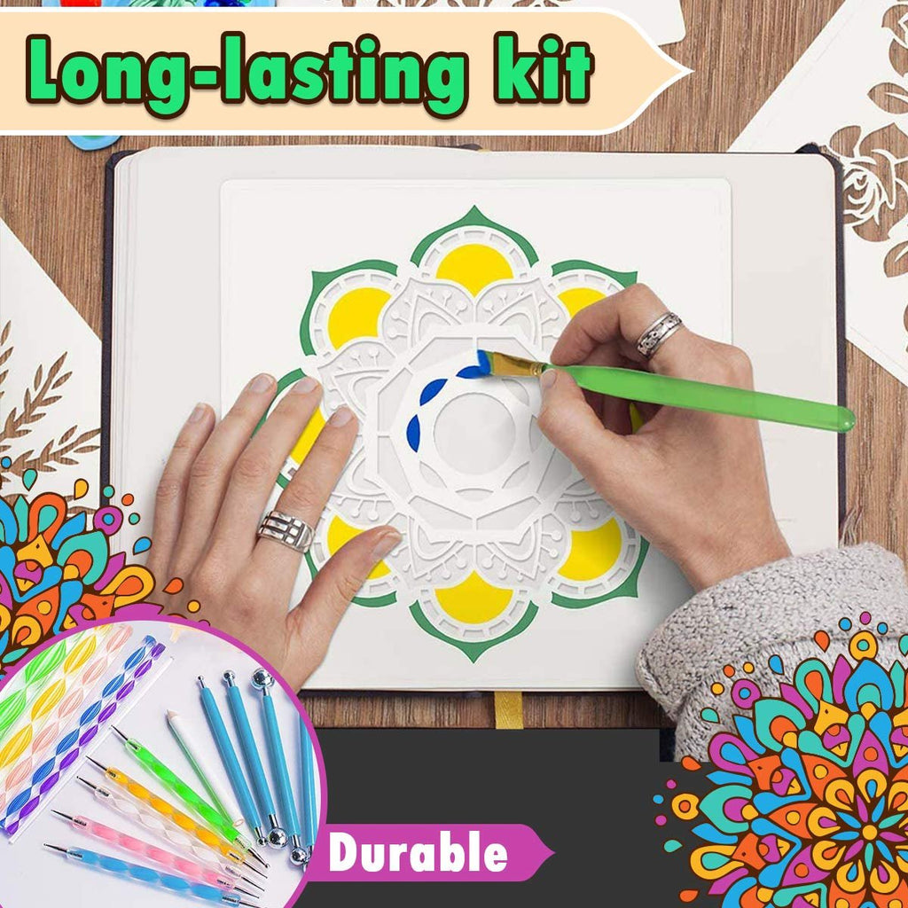Hands painting a mandala stencil with blue paint and a green brush, with dotting tools and stencils visible in a corner.