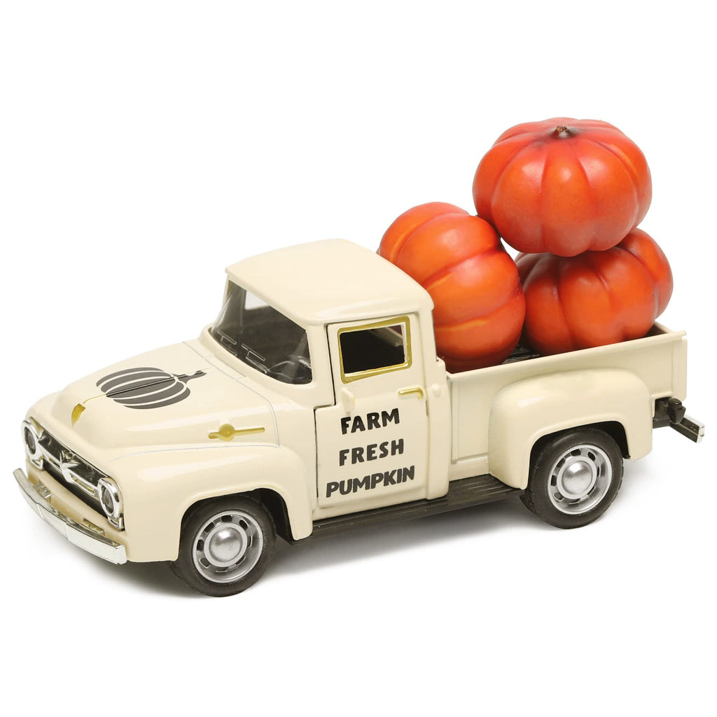 Cream colored diecast farm truck with three orange pumpkins in the bed, text on door reads 'FARM FRESH PUMPKIN'.