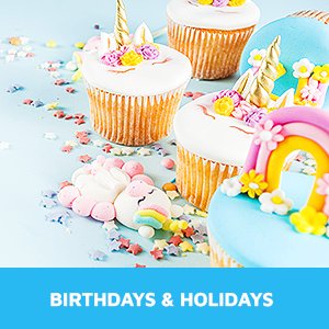 Decorated cupcakes with unicorn and rainbow themes, surrounded by sprinkles on a light blue background.