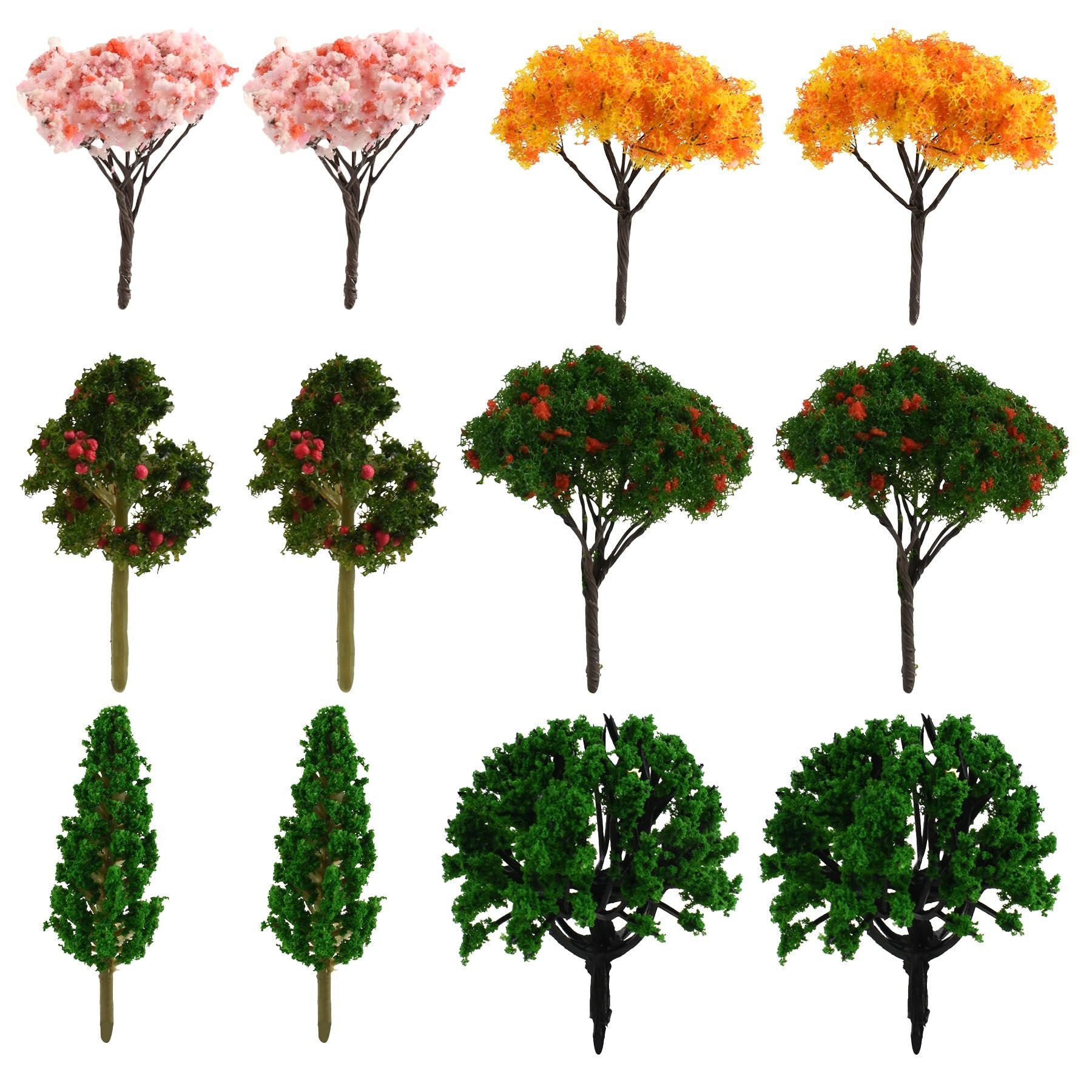 Set of 12 miniature artificial trees with pink, orange, and green foliage, arranged in three rows on a white background.