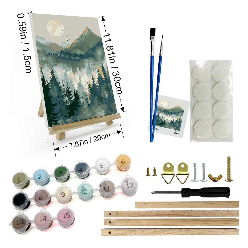 Paint by number kit contents including canvas with mountain landscape, acrylic paint pots, brushes, easel, and hardware on a white background.