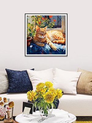 Framed diamond painting of an orange tabby cat resting on a blue blanket by a window with plants.