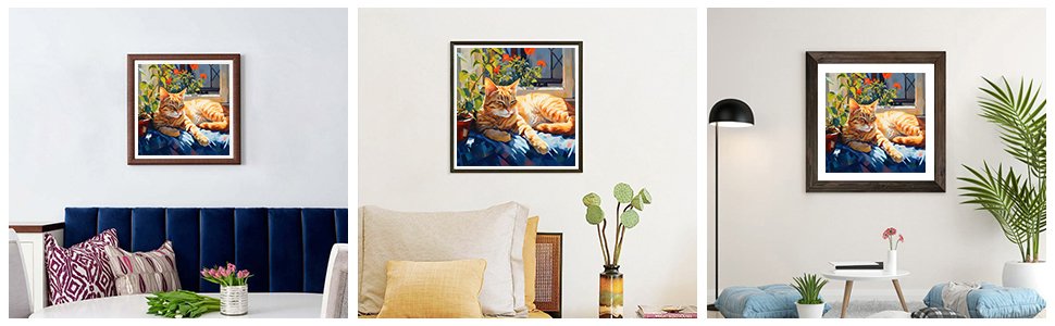 Framed diamond painting of a napping orange tabby cat on a blue blanket by a window with plants.