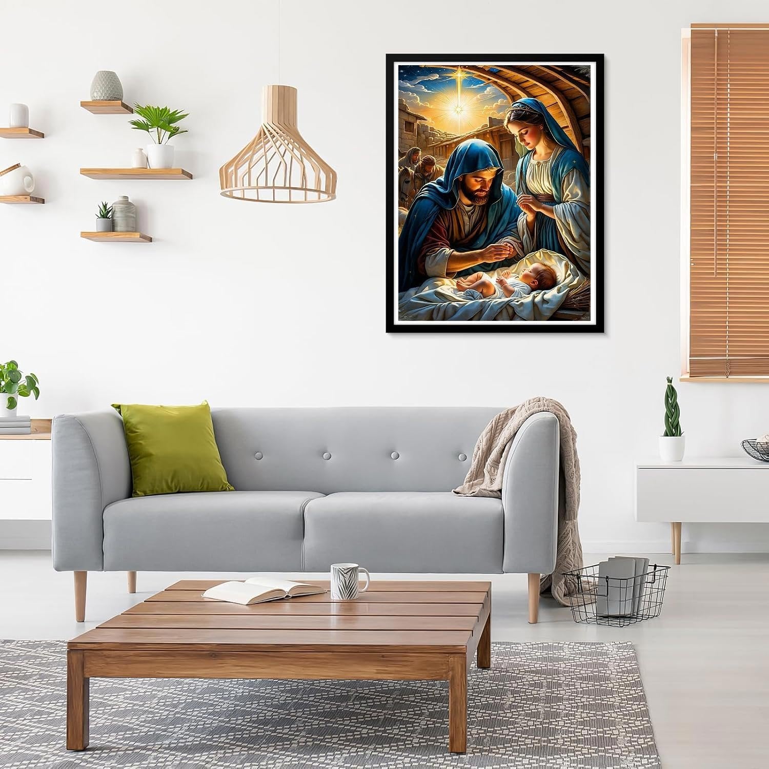 Nativity scene diamond painting artwork hanging on a wall above a sofa in a living room setting.