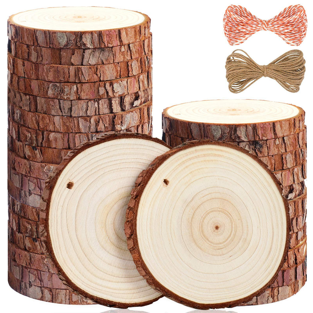 Stack of unfinished natural pine wood slices with bark, two pre-drilled circles in front, and two bows of jute rope above.