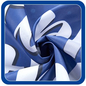 Close-up of swirled navy blue and white fabric with black lettering, likely a banner or tablecloth.